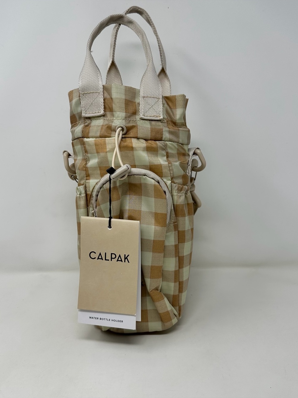Calpak Crossbody Tote Bag in Beige and Cream